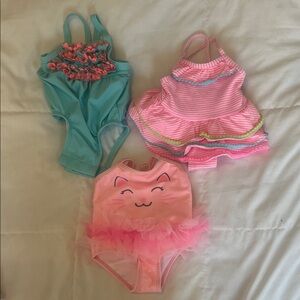 Set of Three Baby Swimsuits in Pink and Blue